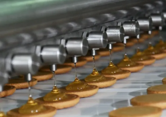 Jakie innowacje w dozowaniu pomagają zachować intensywny smak nadzienia ciastek?